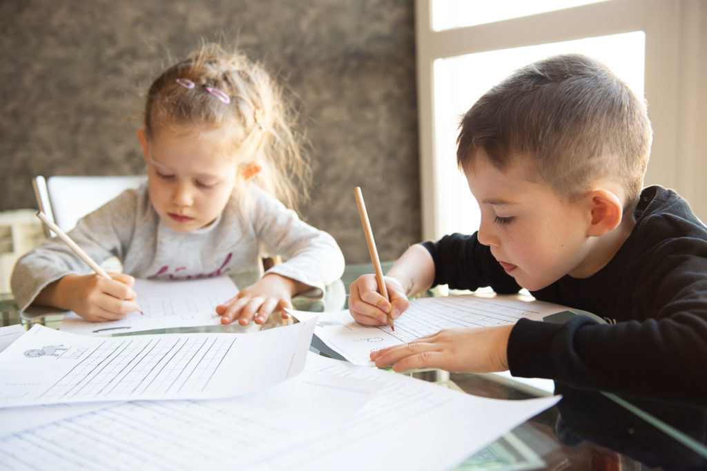 two students working at a desk